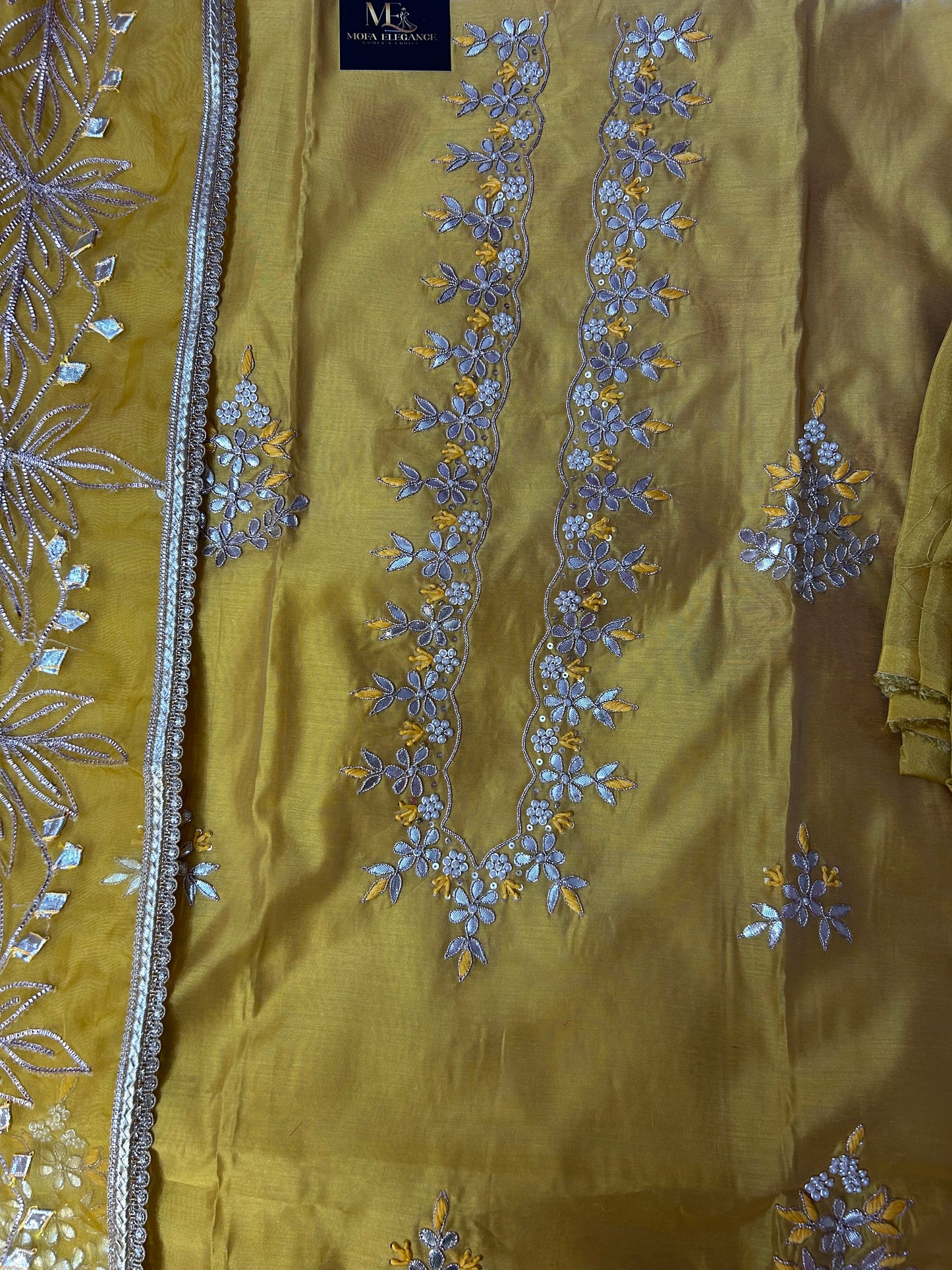 YELLOW CHANDERI SILK SUIT WITH FLOWER AND CHAMKI WORK