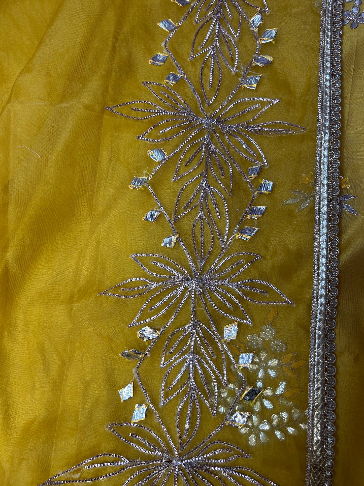 YELLOW CHANDERI SILK SUIT WITH FLOWER AND CHAMKI WORK