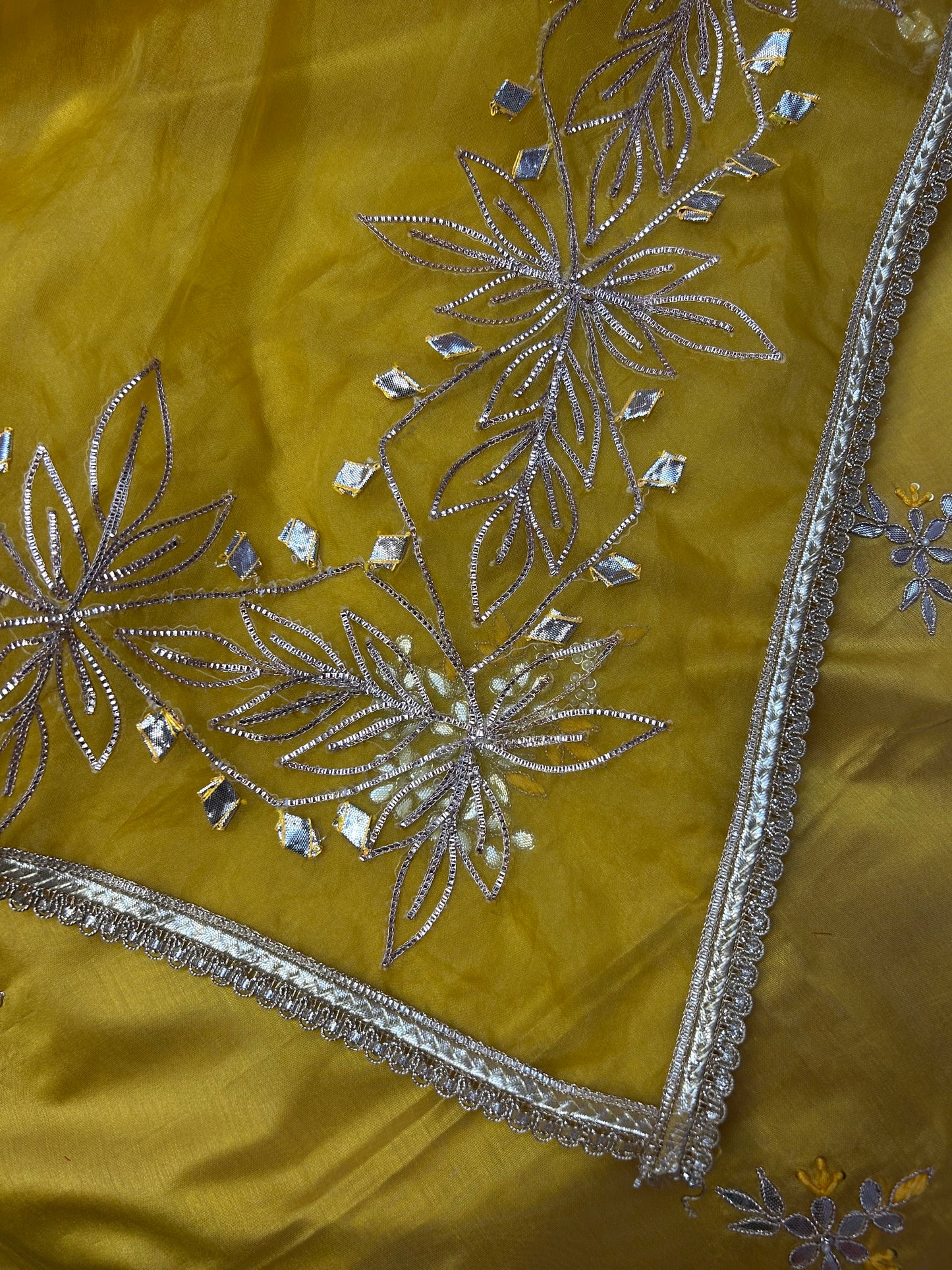 YELLOW CHANDERI SILK SUIT WITH FLOWER AND CHAMKI WORK